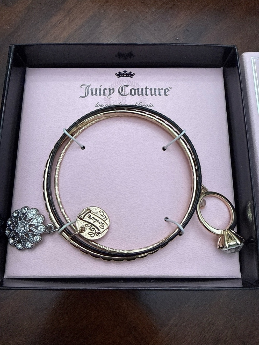 Juicy Couture Gold and Black Layered Charm Bangle Set